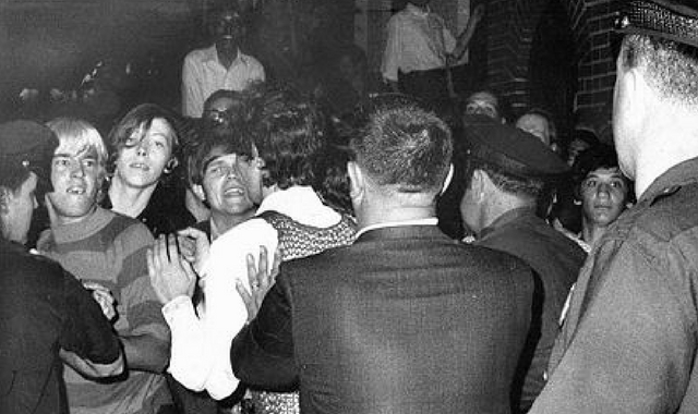 Stonewall riots 1969. Young people fighting with Police. 