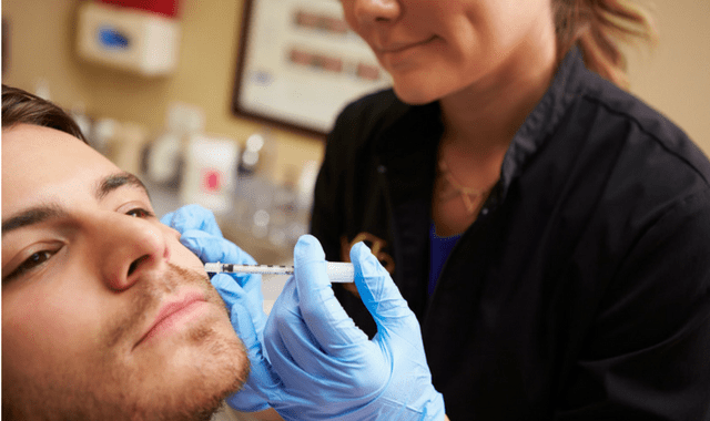 Man receiving botox treatment