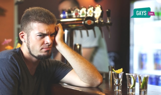 Man sitting in a bar alone